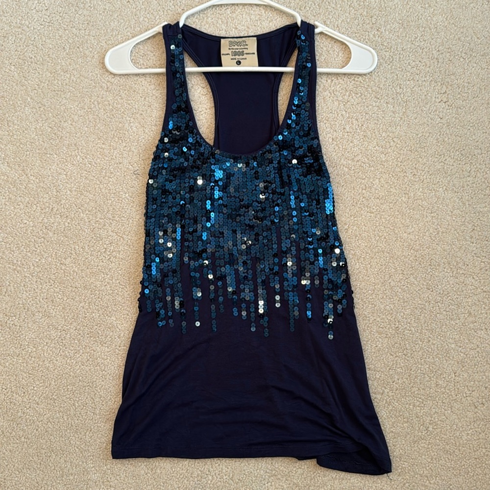 Discovery clothing, women’s tank top size L, blue with glitter.
